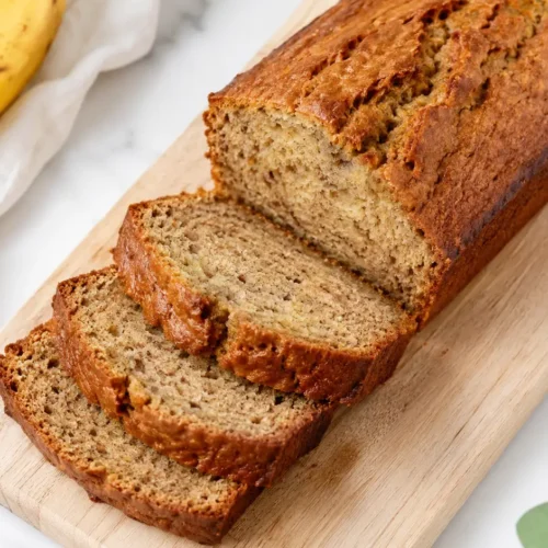 Almond Flour Banana Bread served with berries and yogurt